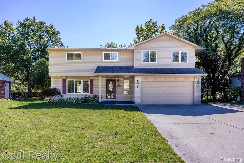 8469 CONCORD Road, Grosse Ile, MI 48138 — front exterior