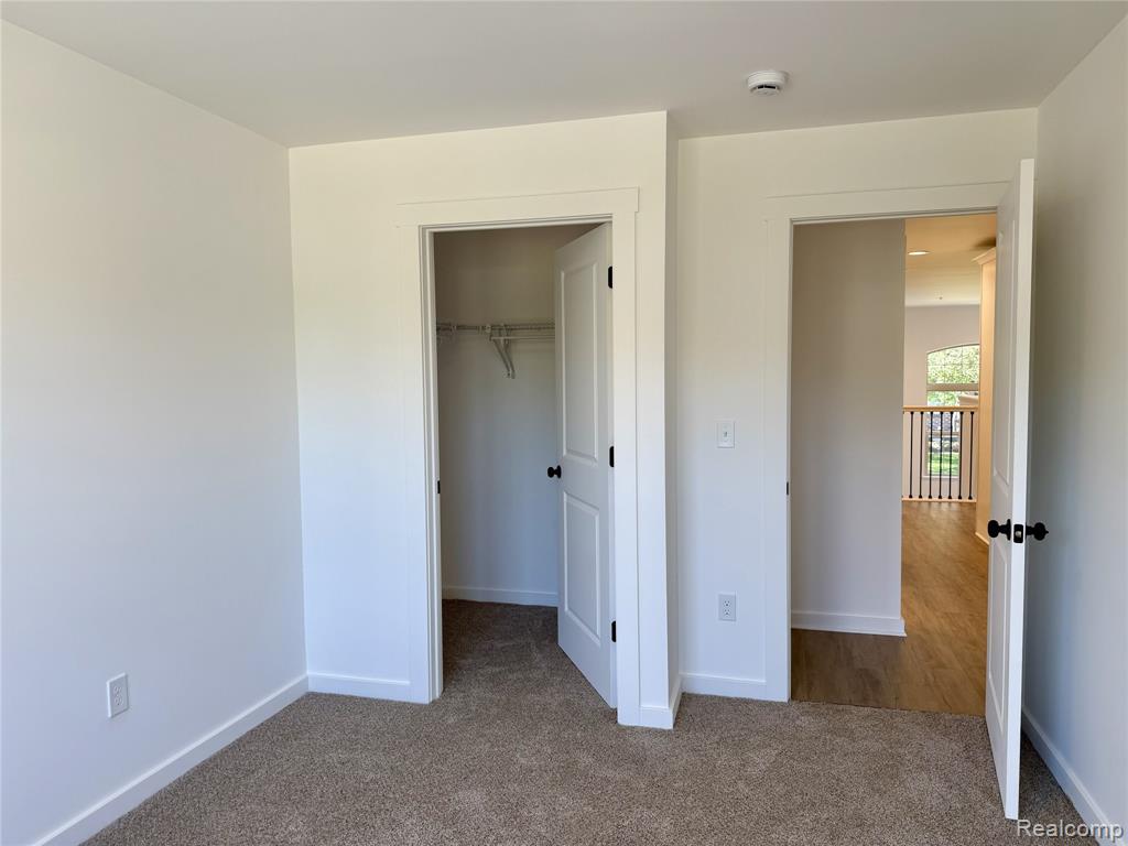 435 Village Drive, Walled Lake, MI 48390 — Photo 23