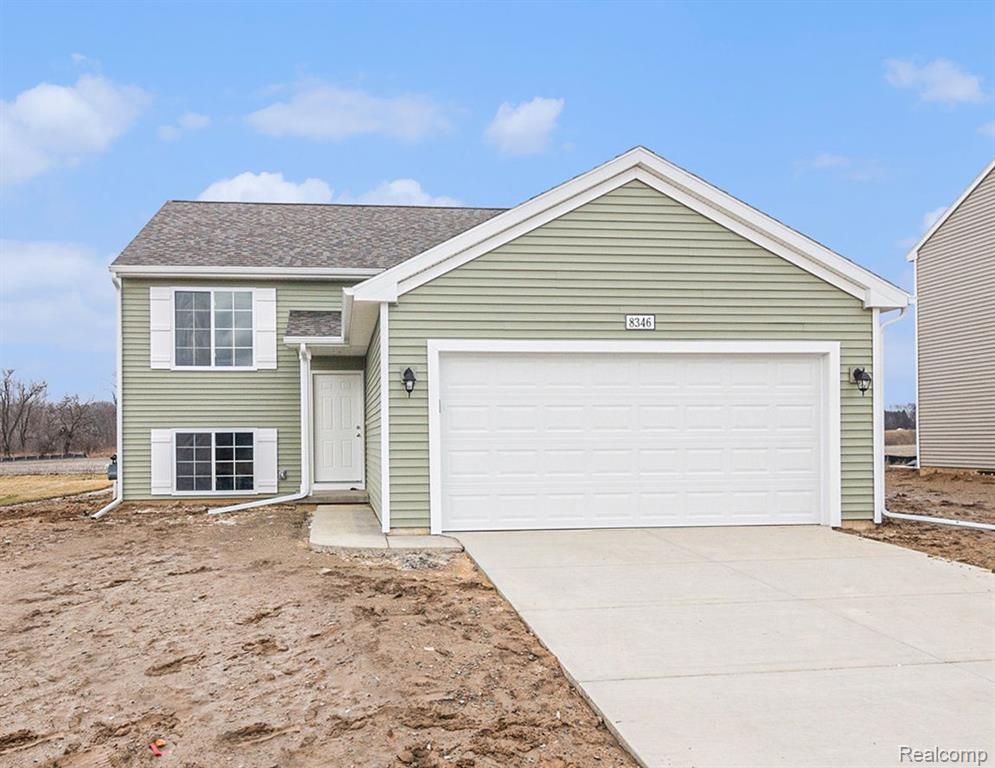 8346 Majestic Boulevard, Fowlerville, MI 48836 — front exterior