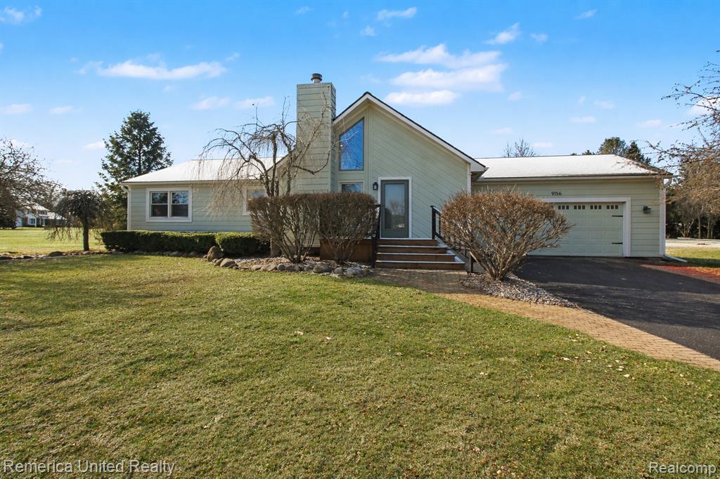 9156 Apple Orchard Drive, Fenton, MI 48430 — front exterior