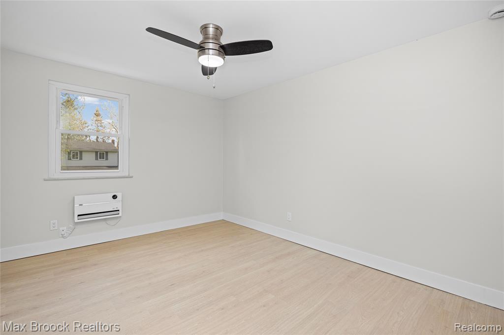 1874 Hopkins Drive, Wixom, MI 48393 — Photo 32