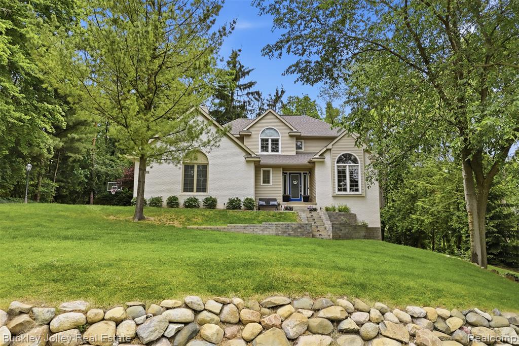 7829 Hillside Lakes Drive, Brighton, MI 48116 — front exterior