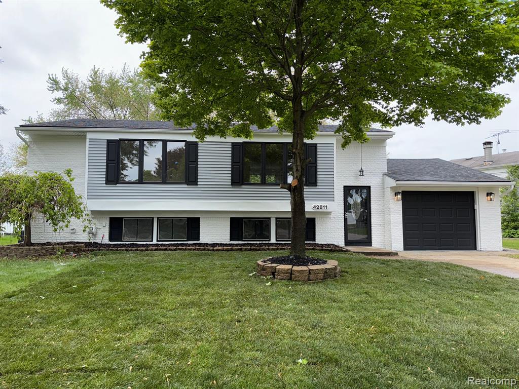 42811 WILMINGTON Drive, Sterling Heights, MI 48313 — front exterior