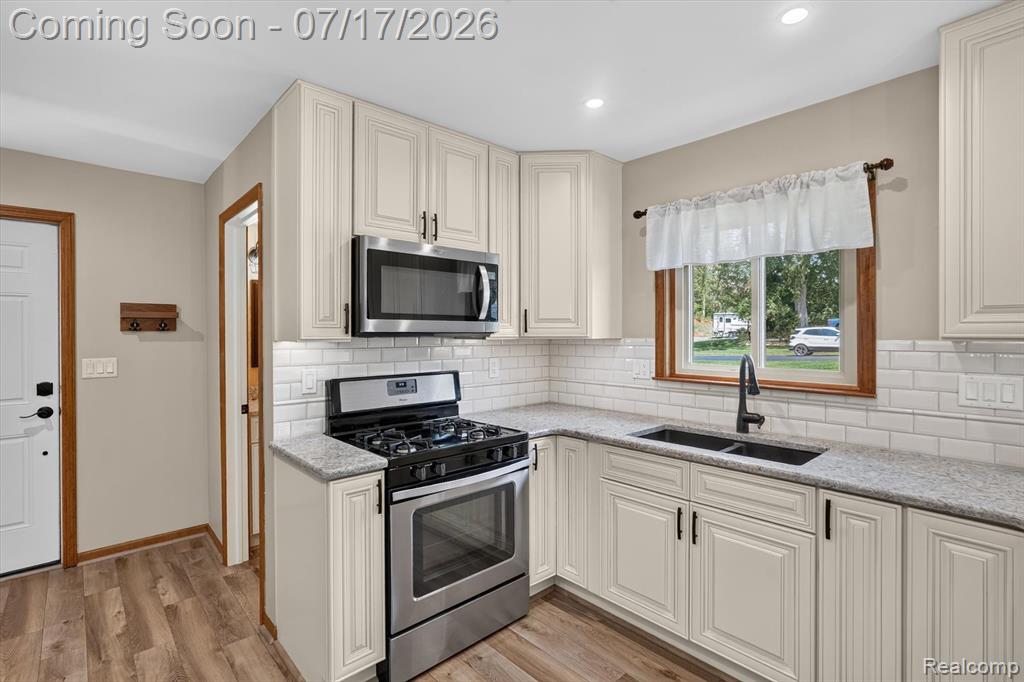 60309 Lamplighter Drive, New Hudson, MI 48165 — Photo 15