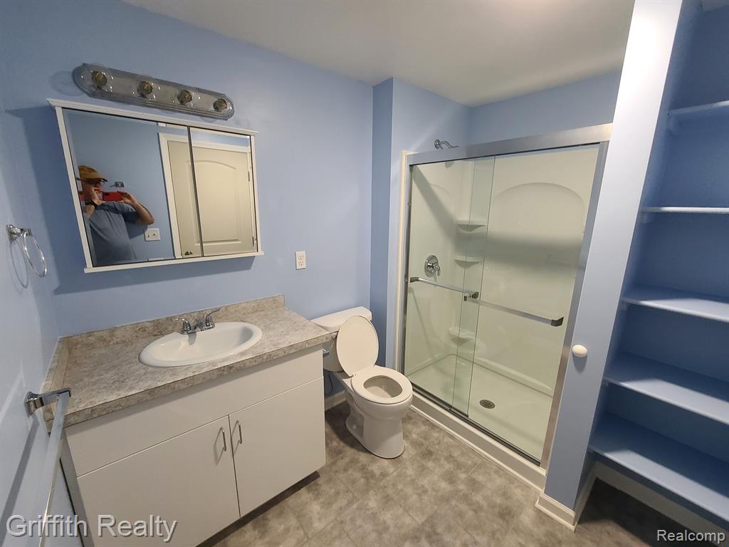 8091 MAJESTIC Boulevard, Fowlerville, MI 48836 — Photo 18