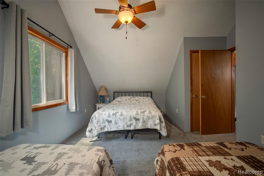 6954 AARWOOD Trail NW, Rapid City, MI 49676 — Photo 21