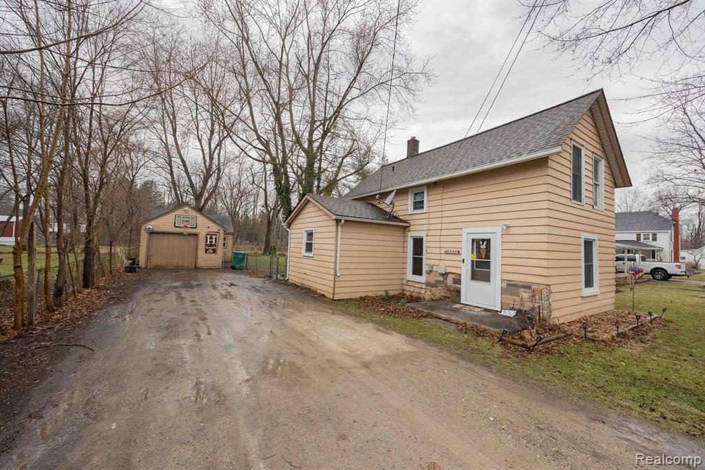 8908 AUGUSTA Street, Willis, MI 48191 — front exterior