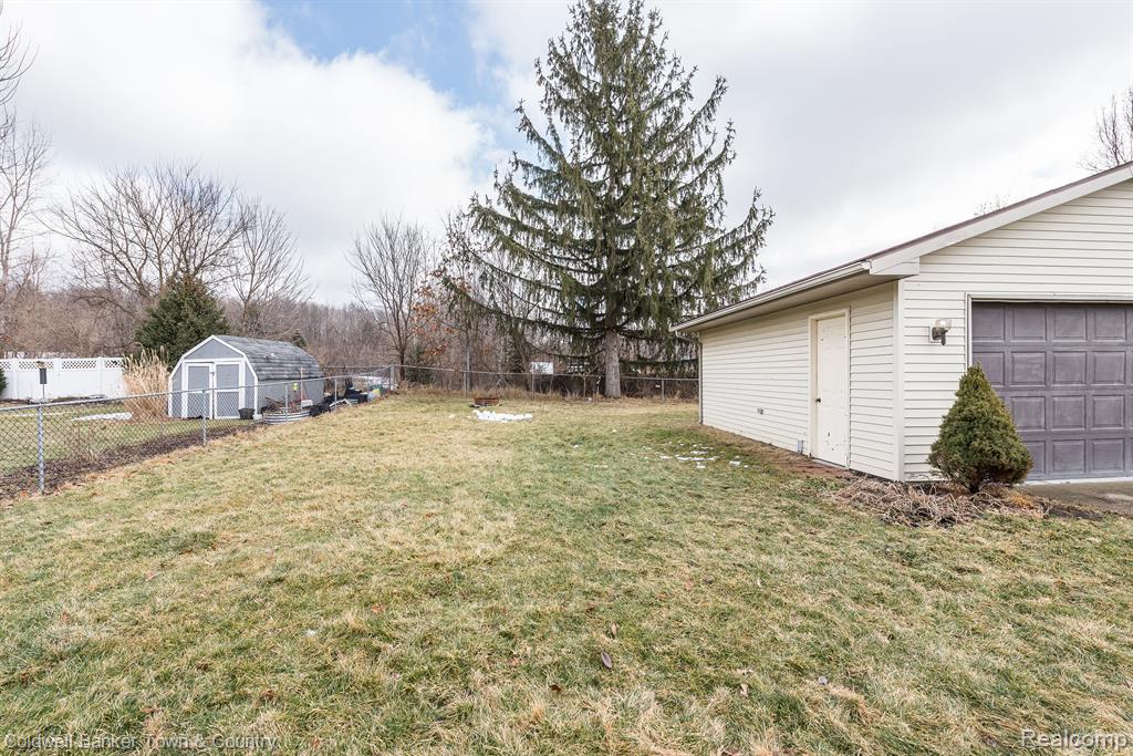 915 TANAGER Trail, Howell, MI 48843 — Photo 32