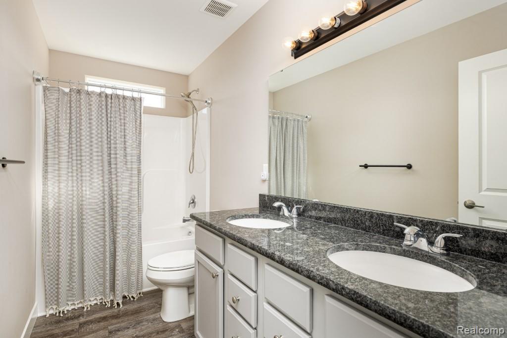 9261 Regency Boulevard, Pinckney, MI 48169 — Photo 24