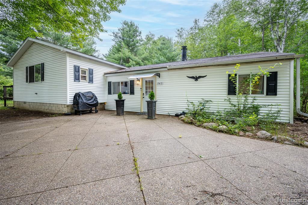 945 N Hockaday Rd in Gladwin sitting on 10 wooded acres