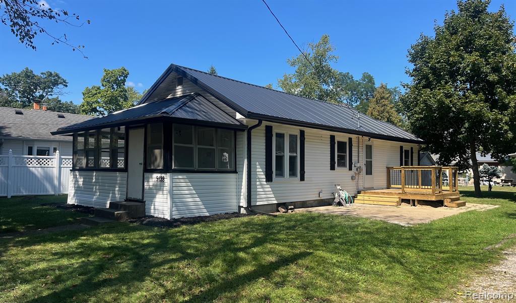 9128 Hickorywood Drive, White Lake, MI — front exterior