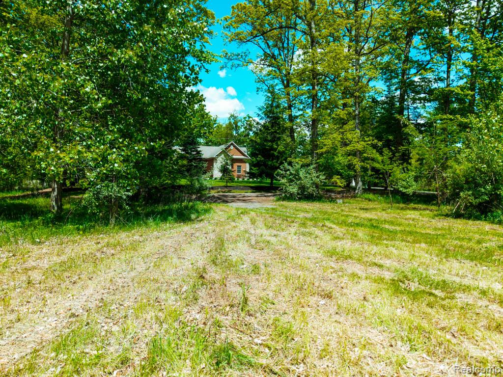 C-1 DOA Lane, Brighton, MI 48114 — front exterior
