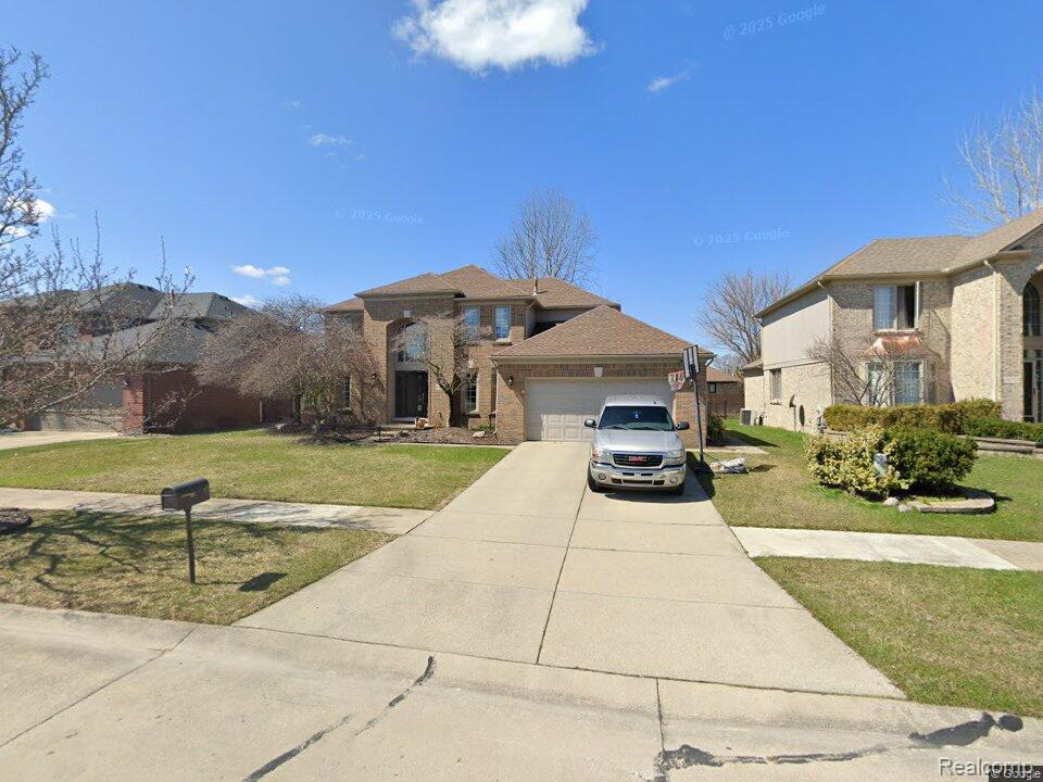 48711 Cross Creek Drive, Macomb, MI 48044 — front exterior