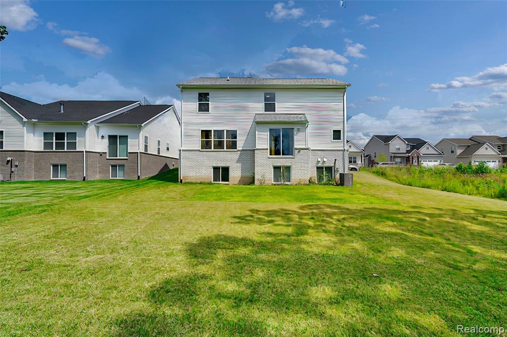 569 Pattan Drive, Wixom, MI 48393 — Photo 40