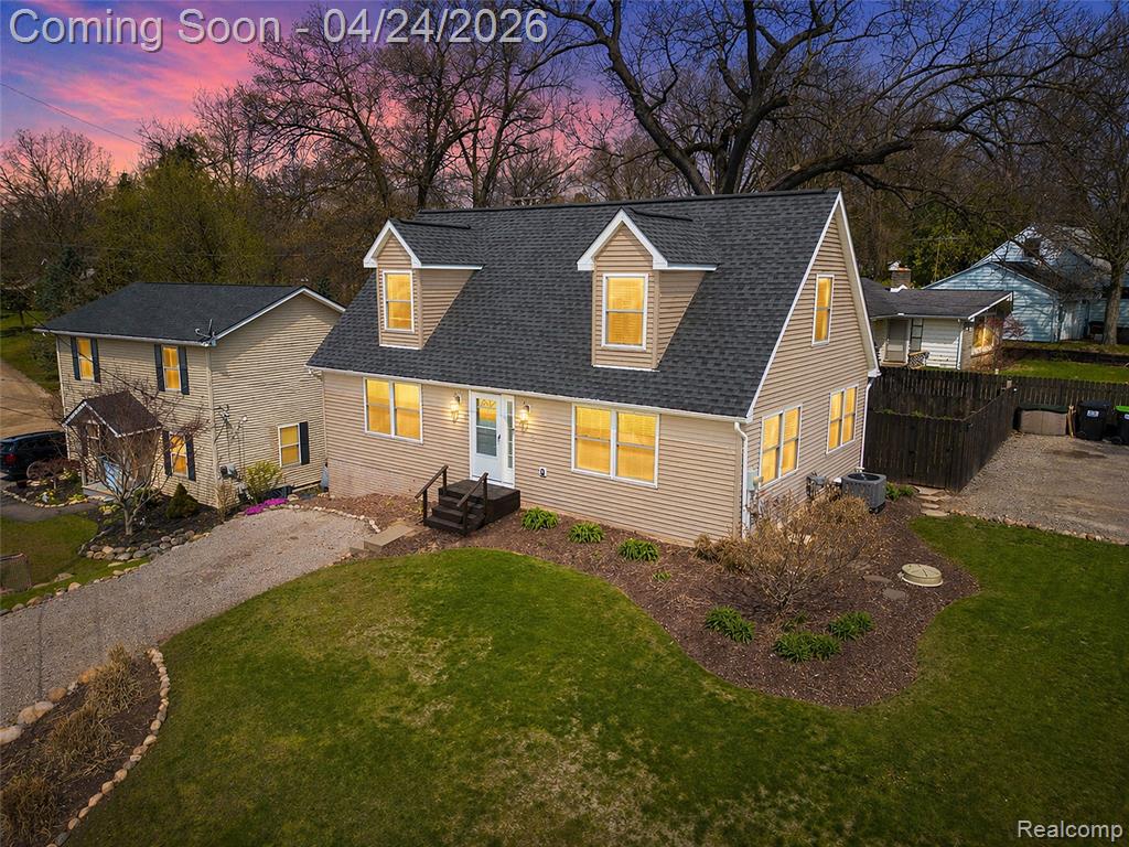7395 Harrington Drive, Brighton, MI 48116 — front exterior