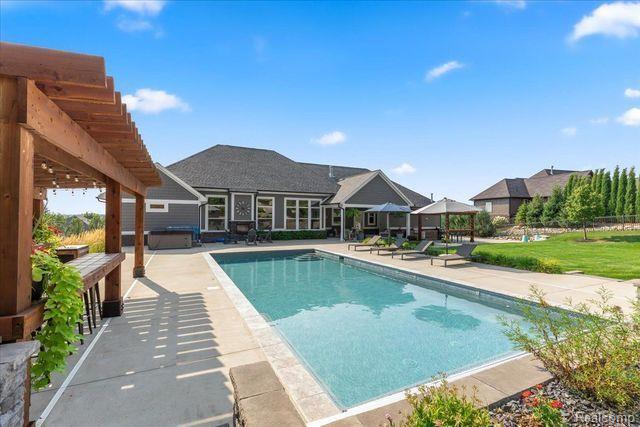 8431 STONEY CREEK Dr., South Lyon, MI 48178 — Photo 36