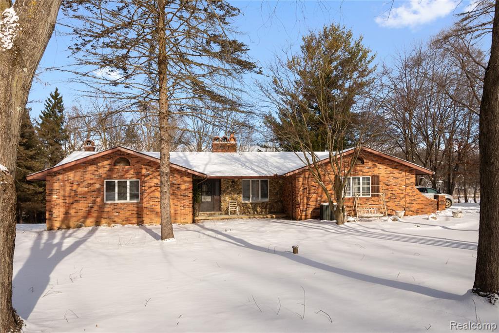 12155 Spencer Road, Milford, MI 48380 — front exterior