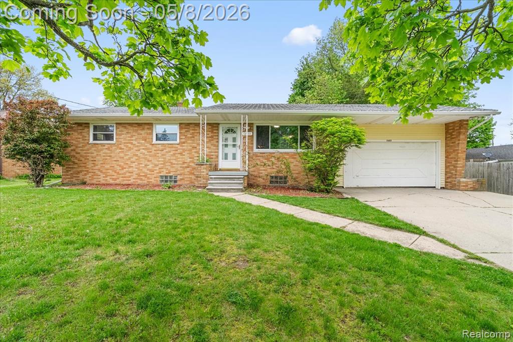 2413 Kuerbitz Drive, Lansing, MI 48906 — front exterior
