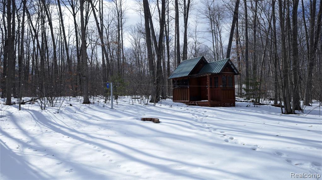 View of yard with a deck