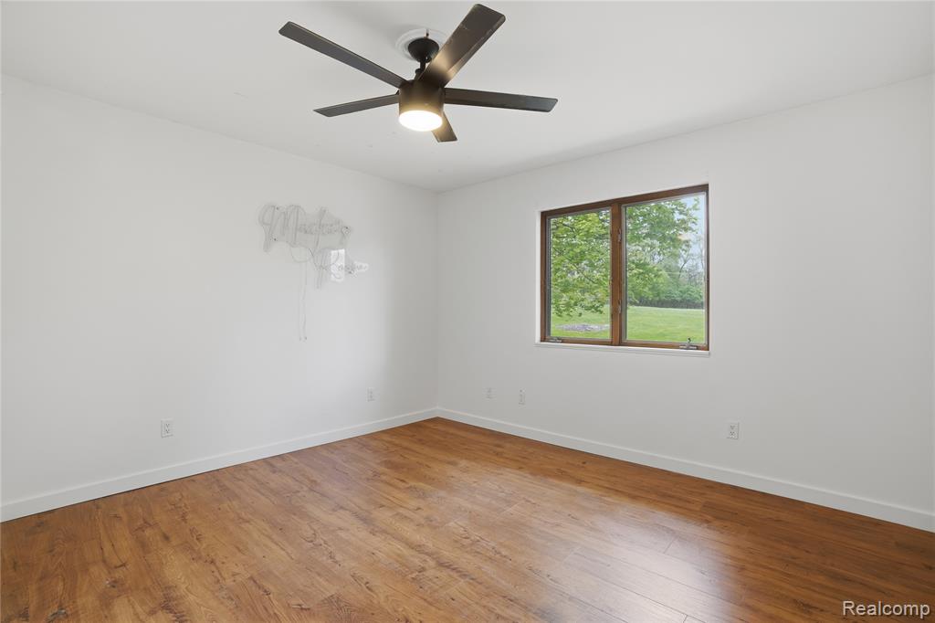 11221 Meadowood Drive, Brighton, MI 48114 — Photo 24