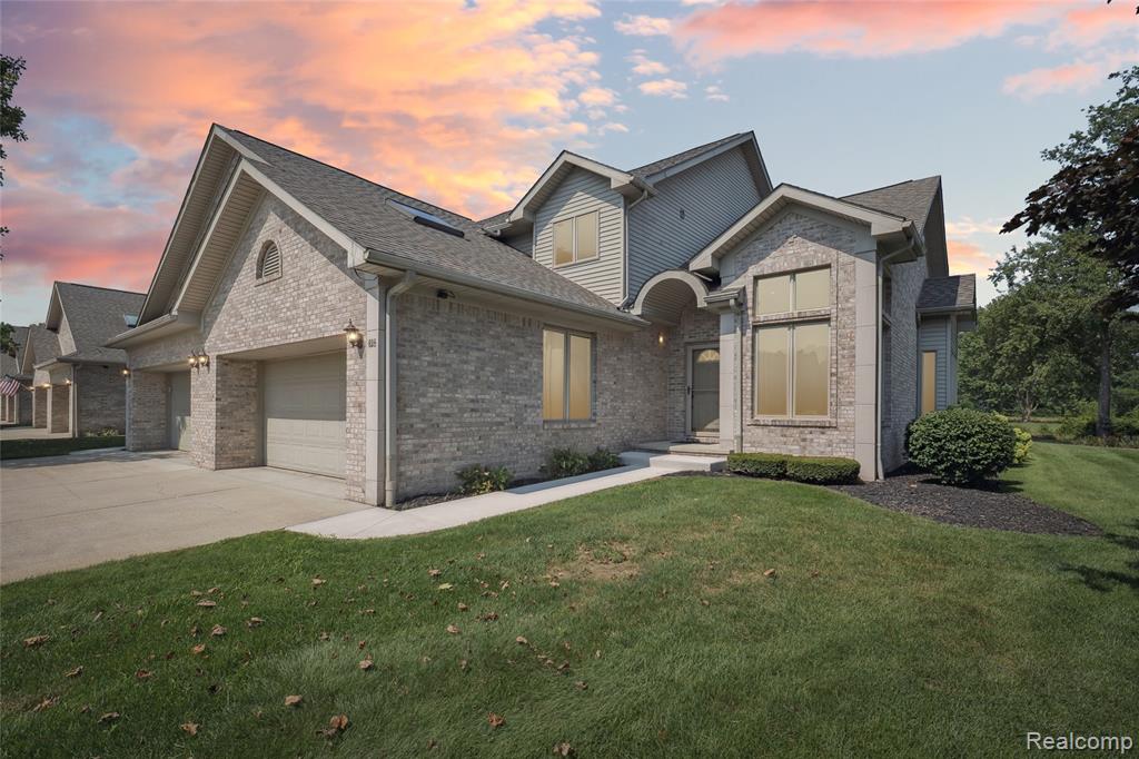 628 Olde Ivy Lane, Howell, MI 48843 — front exterior