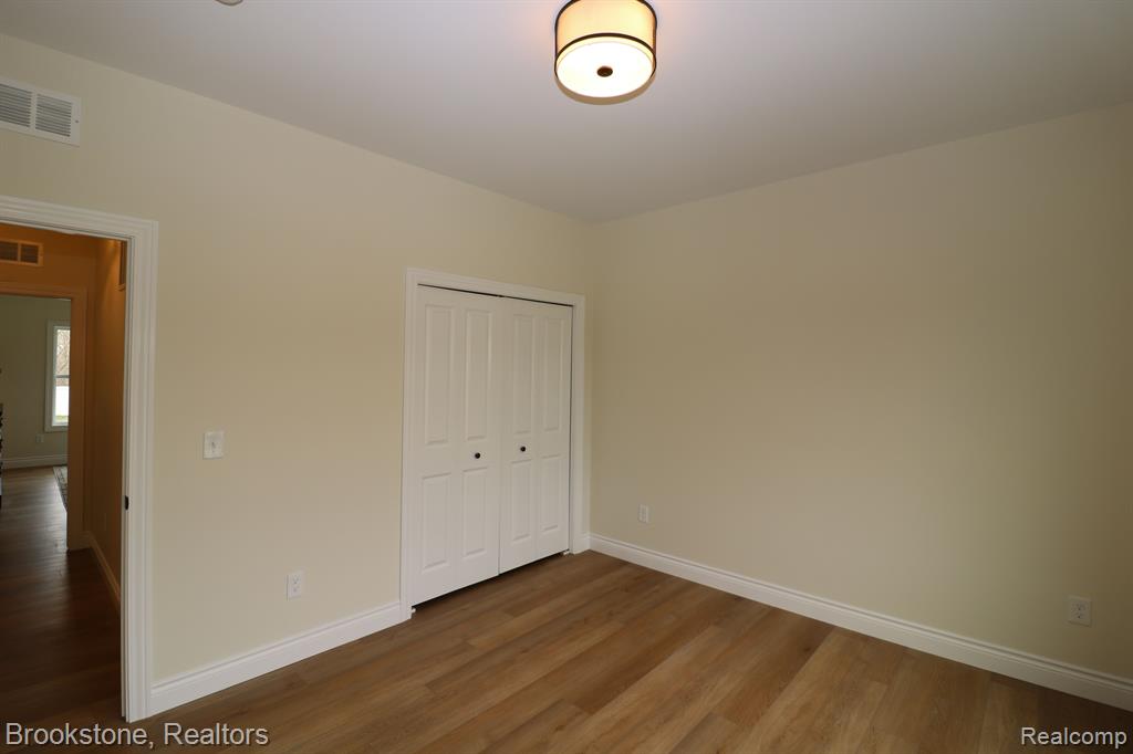 395 GENEVA Court, Howell, MI 48855 — Photo 17