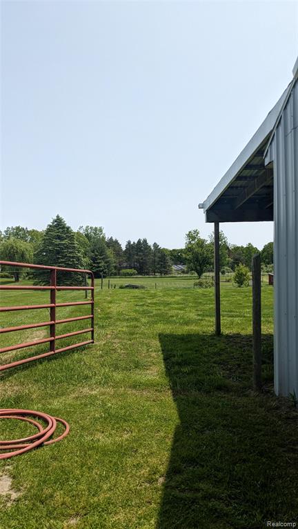 9753 W Coon Lake Road, Webberville, MI 48892 — Photo 28