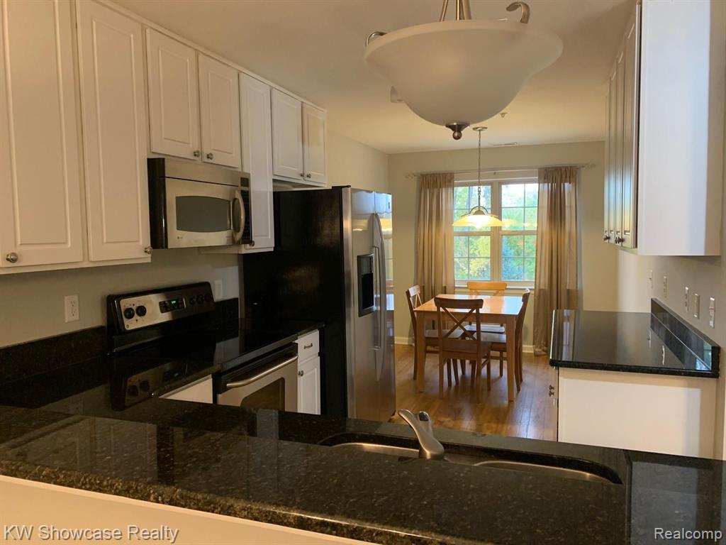 444 Boardwalk Drive, 88, Walled Lake, MI 48390 — Photo 5