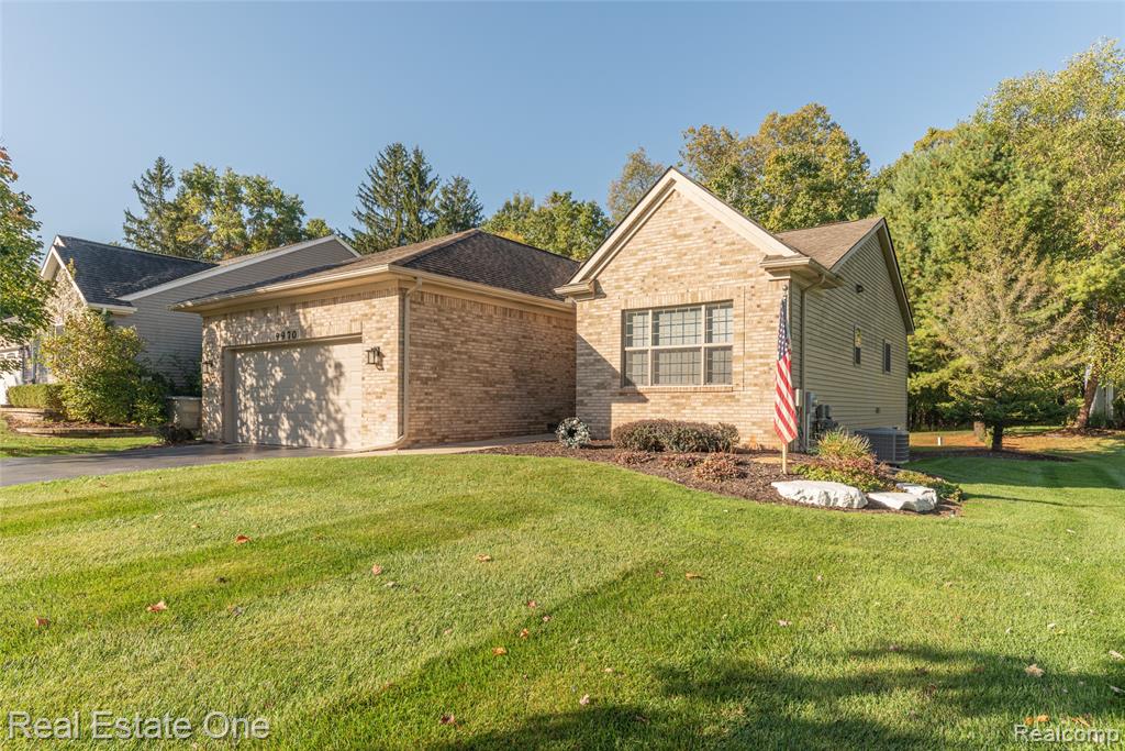 9970 Whispering Woods Drive, Pinckney, MI 48169 — front exterior