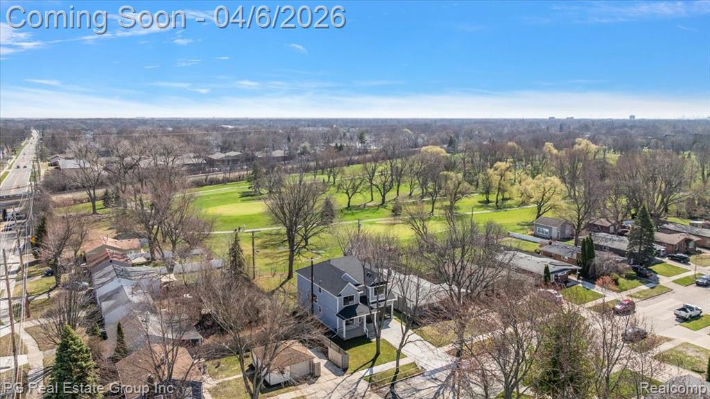 Aerial view of residential area with a golf course