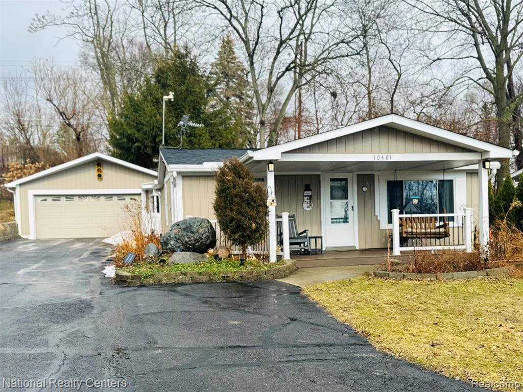 10461 9 Mile Road, Whitmore Lake, MI 48189 — front exterior