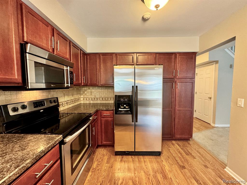 4399 HUNTERS Circle E, Canton, MI 48188 — Photo 6