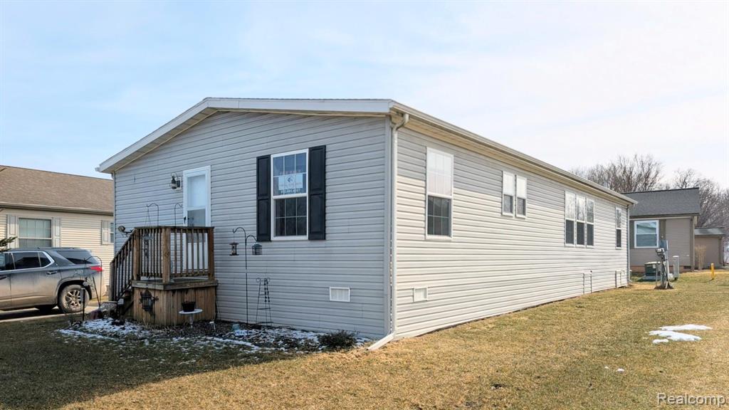 11778 Village Pines Court, South Lyon, MI 48178 — front exterior