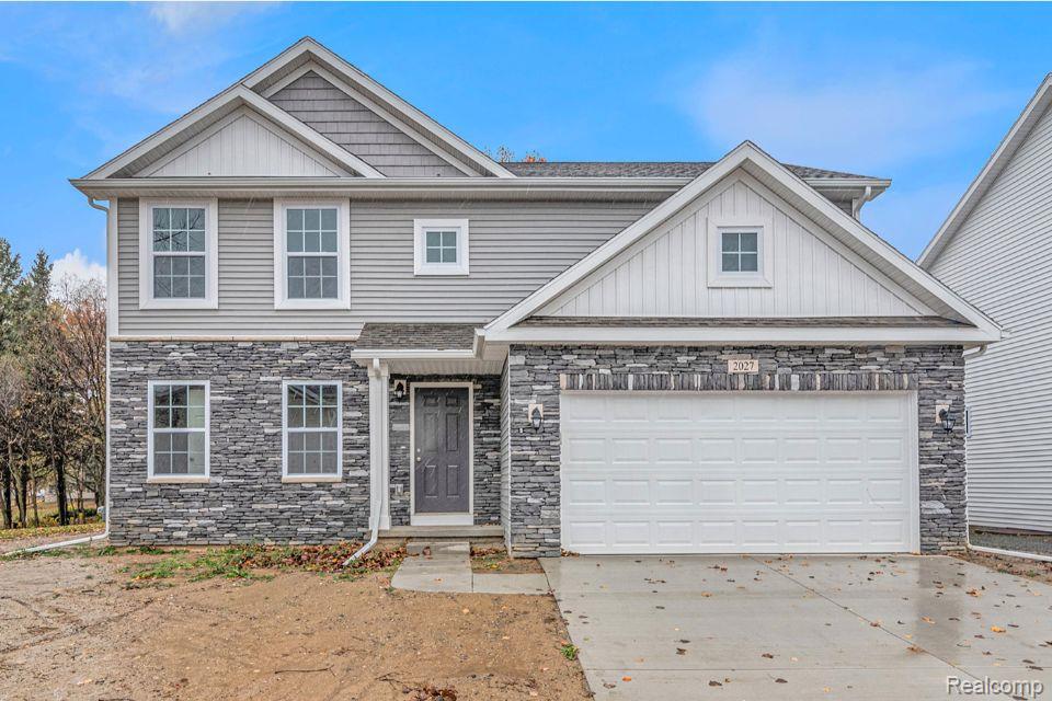 7377 River Rock Drive, Davison, MI 48423 — front exterior