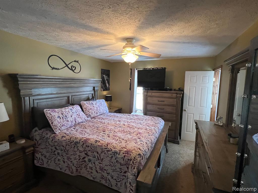 744 VILLAGE Drive, Fowlerville, MI 48836 — Photo 14