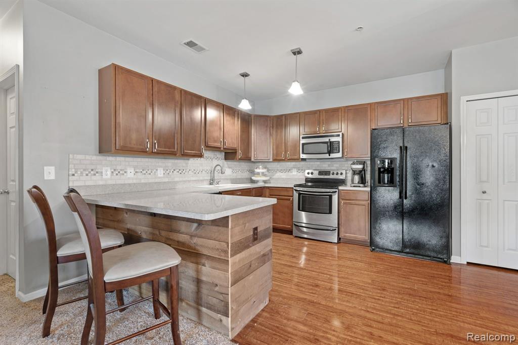 10086 RIDGE RUN Street, 36, Howell, MI 48855 — Photo 7