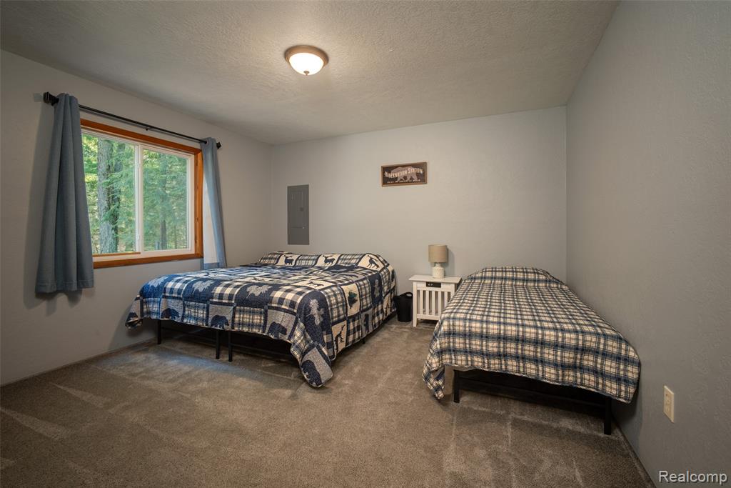 6954 AARWOOD Trail NW, Rapid City, MI 49676 — Photo 23