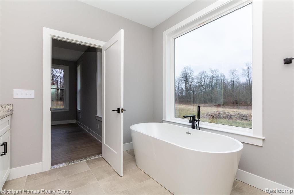 2910 LOON Drive, Wixom, MI 48393 — Photo 52
