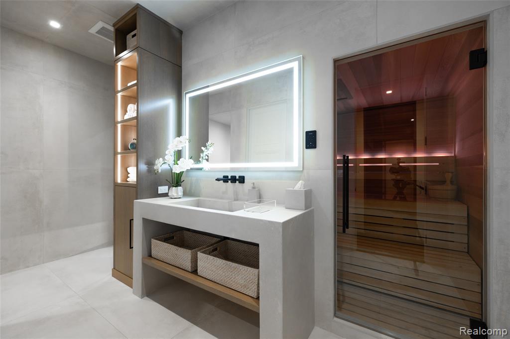 Full bath with a sauna / steam room, vanity, tile patterned floors, an enclosed shower, and recessed lighting