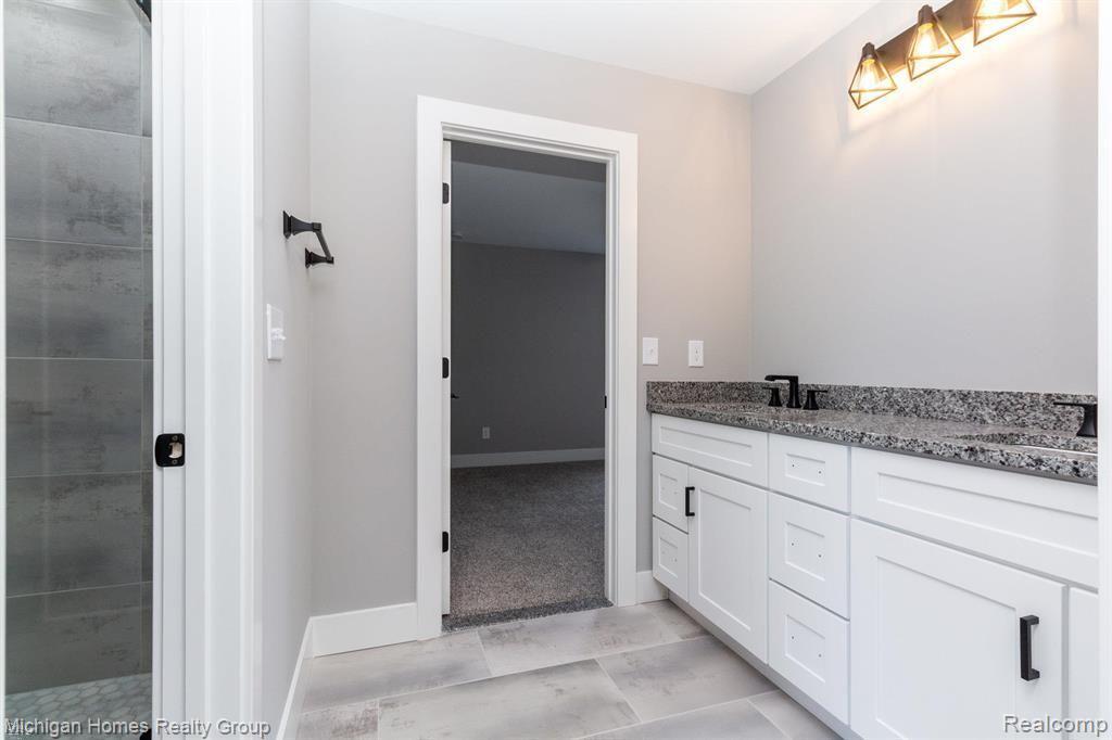 2910 LOON Drive, Wixom, MI 48393 — Photo 42