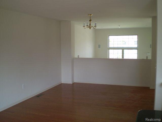 410 BOARDWALK Drive, Walled Lake, MI 48390 — Photo 4