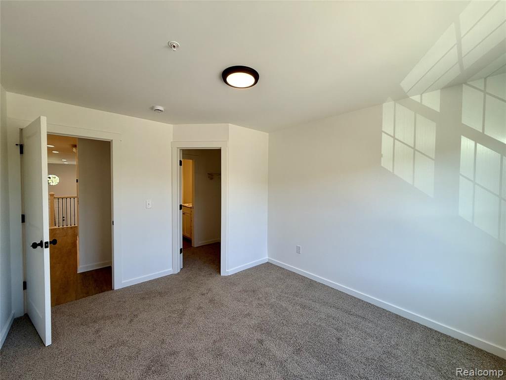 435 Village Drive, Walled Lake, MI 48390 — Photo 18