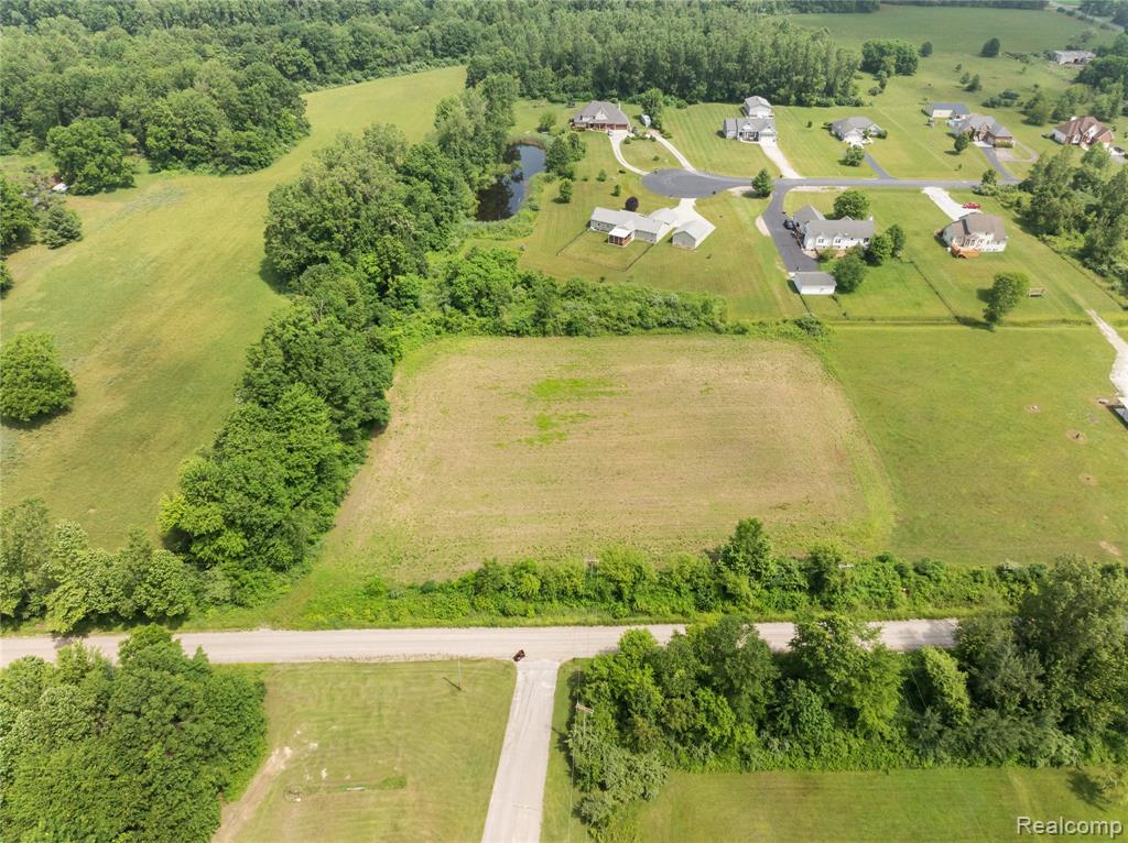 V/L - 1 Macey Road, Willis, MI 48191 — front exterior