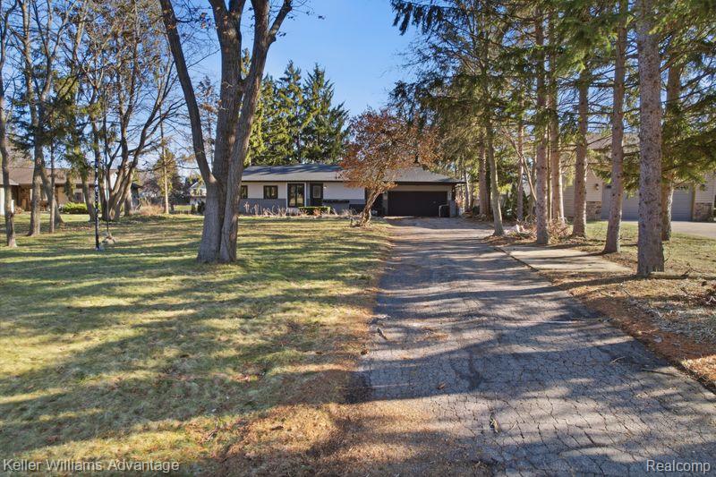 1210 Craven Drive, Highland, MI 48356 — Photo 40