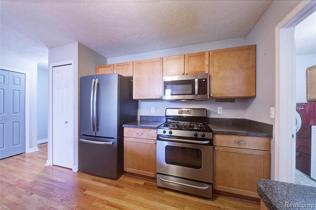 1040 Spirea, Howell, MI 48843 — Photo 11
