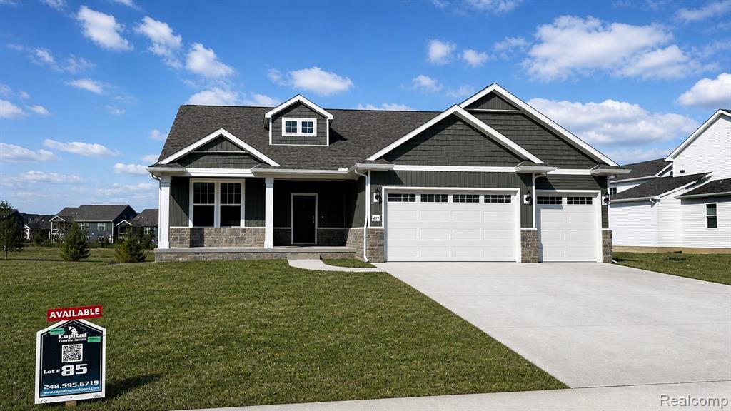 677 Round Rock Dr, Howell, MI 48843 — Photo 2