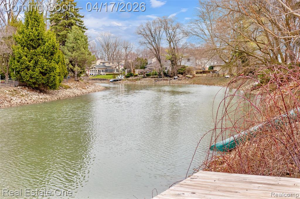Dock area featuring a water view