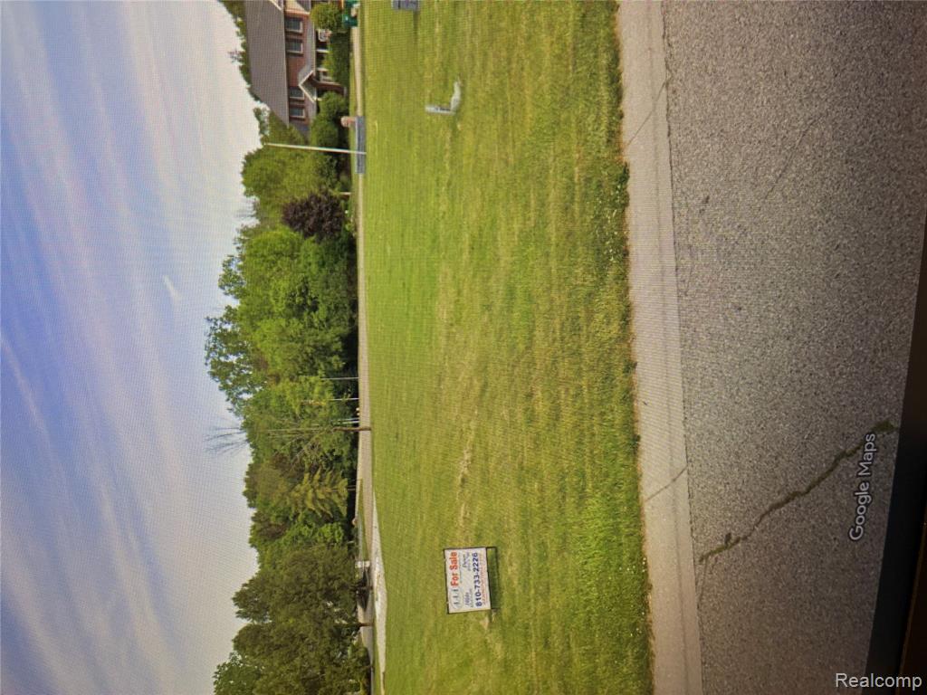 748 Bending Court, Flushing, MI 48433 — front exterior