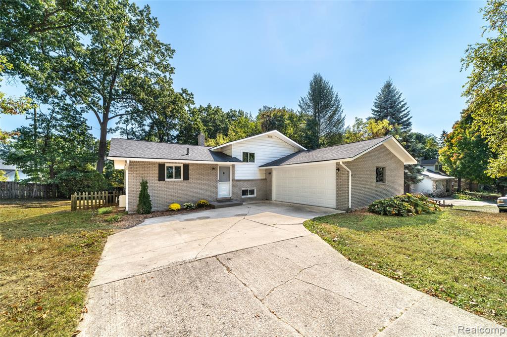 8239 Atha Street, White Lake, MI — front exterior