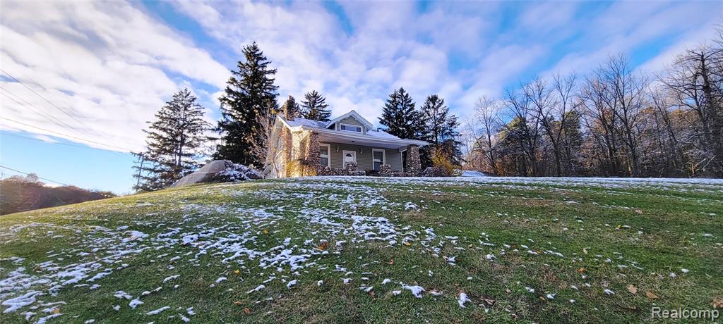 5025 N Hickory Ridge Road, Highland, MI — front exterior